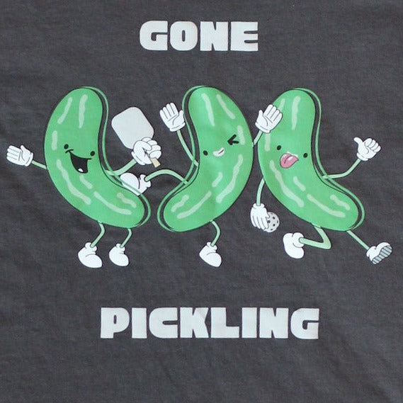 dancing pickles playing pickleball